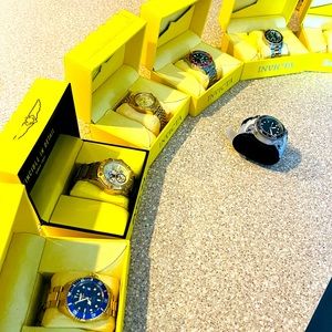 Seven men’s Invicta watches for sale. MUST GO!